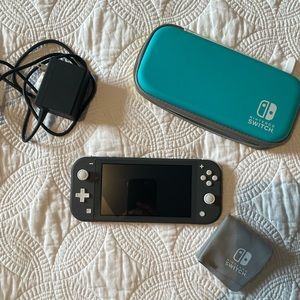 Nintendo Switch Lite with case and charger